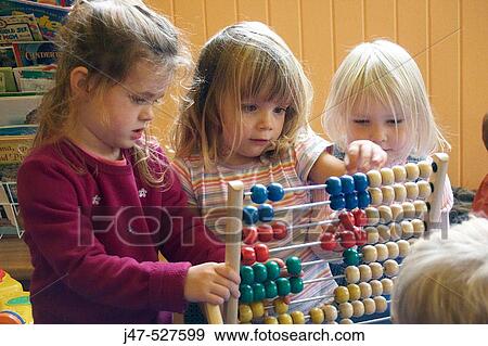 Stock Photo - Group of young children playing together. Fotosearch