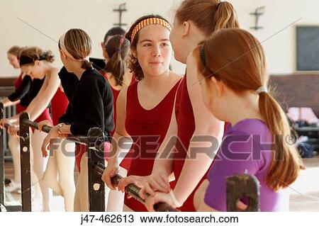 Group of young teenage girls in a dance class, talking at the bar. View Large Photo Image Stock Image - Group of young teenage girls in a dance class, talking at the bar.. Fotosearch