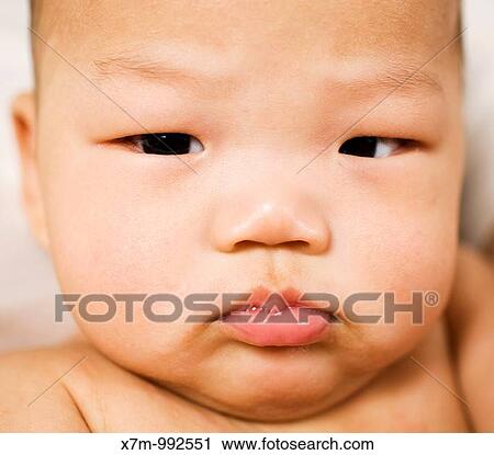 Grumpy Korean baby View Large Photo Image Stock Image - Grumpy Korean baby. Fotosearch