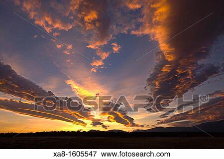 Stock Photo - Guadarrama mountains at sunset, Madrid, Spain. Fotosearch