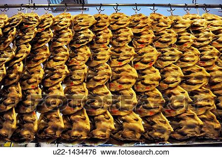 Stock Photograph - Guangzhou (China): ducks sold in a shop of Changshoulu. Fotosearch
