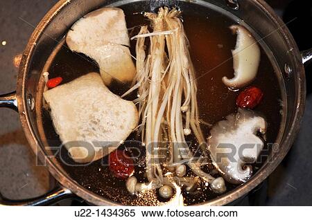 Stock Photography - Guangzhou (China): mushrooms soup in a restaurant of Tianhe. Fotosearch