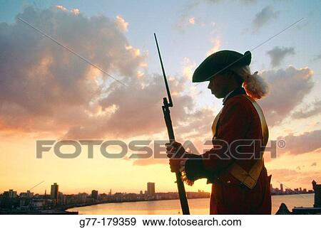 Stock Photo - Guard with old costume at the fortress of El Morro, Havana, Cuba. Fotosearch
