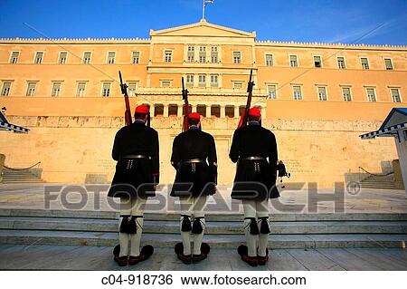 Guards at the Monument to the Unknown Soldier and Parliament, Syntagma Square, Athens. Greece View Large Photo Image Stock Photograph - Guards at the Monument to the Unknown Soldier and Parliament, Syntagma Square, Athens. Greece. Fotosearch