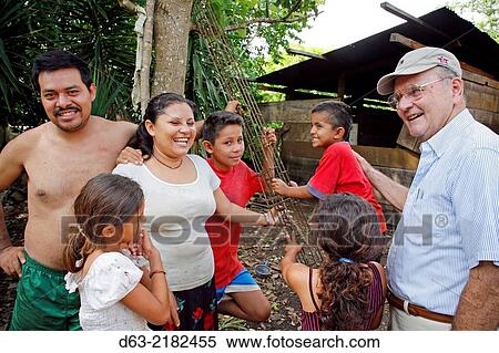 Stock Photography - GUATEMALA. American missionary Catholic Brother working with returnees who had been displaced by the war. Peten.. Fotosearch