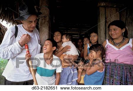 GUATEMALA. American missionary priest in the Peten. With local children.. View Large Photo Image Stock Image - GUATEMALA. American missionary priest in the Peten. With local children... Fotosearch