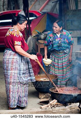 Guatemala, Mayan women making beans View Large Photo Image Stock Image - Guatemala, Mayan women making beans. Fotosearch