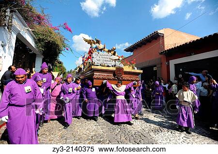 Stock Photography - Guatemala men carry an anda for procession during Semana Santa(Holy Week) in Antigua, Guatemala. Fotosearch