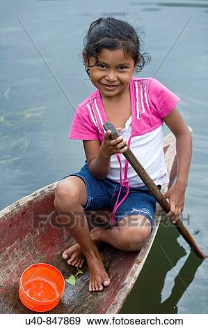 Guatemala, Rio Dulce, girl in canoe View Large Photo Image Stock Photo - Guatemala, Rio Dulce, girl in canoe. Fotosearch