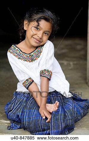 Guatemala, Rio Dulce, girl sitting on porch View Large Photo Image Stock Photography - Guatemala, Rio Dulce, girl sitting on porch. Fotosearch