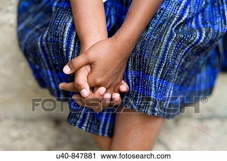 Guatemala, Rio Dulce, girl with clasped hands View Large Photo Image Stock Image - Guatemala, Rio Dulce, girl with clasped hands. Fotosearch