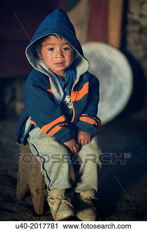 Guatemala, San Jose Poaquil, boy sitting on bench View Large Photo Image Stock Image - Guatemala, San Jose Poaquil, boy sitting on bench. Fotosearch