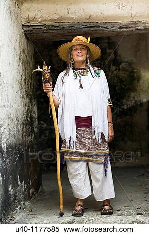 Stock Photography - Guatemala, Tikal, Shaman in temple doorway. Fotosearch
