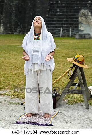Picture - Guatemala, Tikal, Shaman praying. Fotosearch