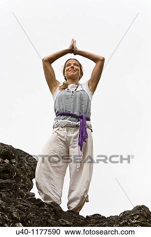 Guatemala, Tikal, woman doing Yoga View Large Photo Image Stock Image - Guatemala, Tikal, woman doing Yoga. Fotosearch