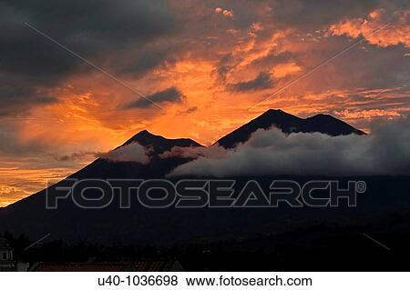 Stock Photo - Guatemala, view of Volcan de Fuego and Acatenango, sunset. Fotosearch