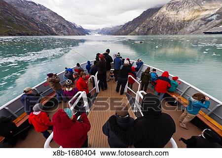 Picture - Guests from the Lindblad Expeditions ship National Geographic Sea Bird in Glacier Bay National Park, Southeast Alaska, USA. Fotosearch