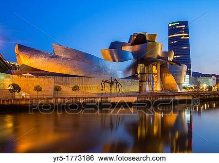 Guggenheim museum in Bilbao Iberdrola Tower in background Bilbao, Basque Country, Spain View Large Photo Image Stock Photograph - Guggenheim museum in Bilbao Iberdrola Tower in background Bilbao, Basque Country, Spain. Fotosearch