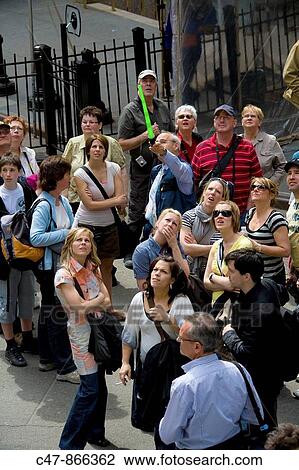 Guide and tourists, Wall Street, New York City, USA View Large Photo Image Stock Image - Guide and tourists, Wall Street, New York City, USA. Fotosearch