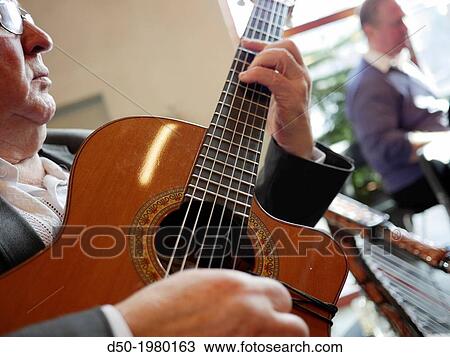 Stock Image - Guitar player, Stockholm, Sweden. Fotosearch