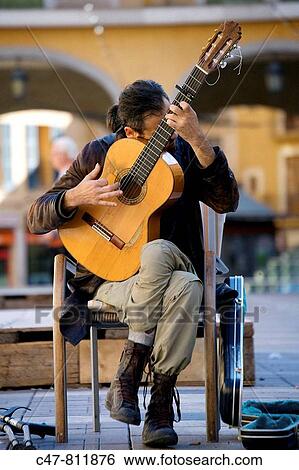 Stock Photograph - Guitarist in Pla? a Major, Palma de Mallorca, Majorca, Balearic Islands, Spain. Fotosearch