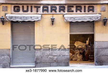 Stock Image - Guitarrer? a (guitar shop). Madrid, Spain. Fotosearch