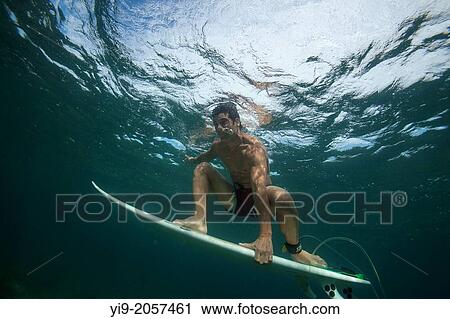 guy surfing under water. View Large Photo Image Stock Image - guy surfing under water.. Fotosearch