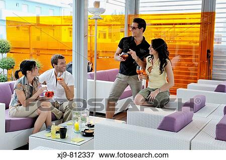 Guys who drink cocktails and toasting. View Large Photo Image Stock Photo - Guys who drink cocktails and toasting.. Fotosearch