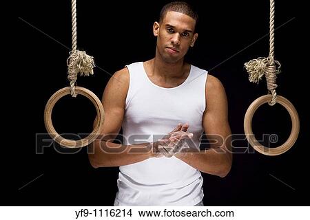 Gymnast man on Rings. View Large Photo Image Picture - Gymnast man on Rings.. Fotosearch