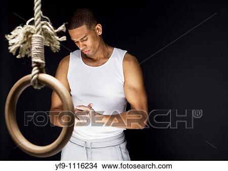 Gymnast man on Rings. View Large Photo Image Picture - Gymnast man on Rings.. Fotosearch