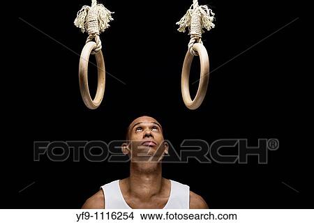 Gymnast man on Rings. View Large Photo Image Picture - Gymnast man on Rings.. Fotosearch