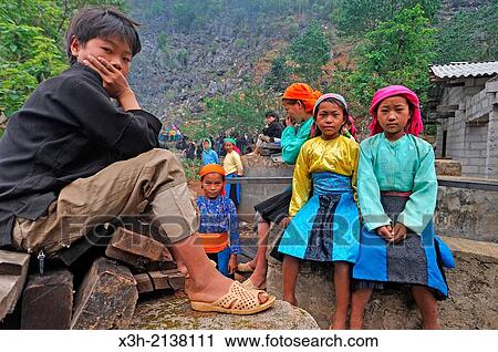 H? mong teenagers during funeral in a village around Sa Phin, Ha Giang province, Northern Vietnam, southeast asia. View Large Photo Image Stock Image - H? mong teenagers during funeral in a village around Sa Phin, Ha Giang province, Northern Vietnam, southeast asia.. Fotosearch