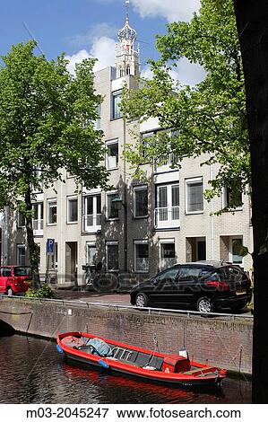 Haarlem Netherlands Europe small boats on canal in city center. View Large Photo Image Stock Photo - Haarlem Netherlands Europe small boats on canal in city center.. Fotosearch