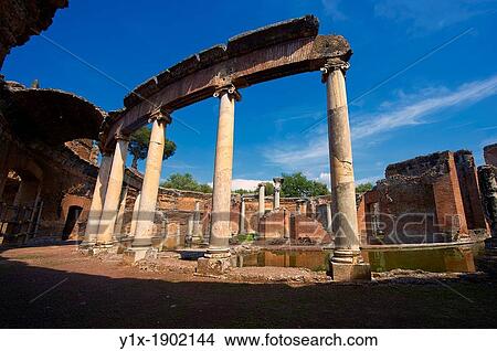 Hadrian's Villa Villa Adriana 2nd century AD - The Maritime Theatre Teatro Marittimo, so called because of its shape and marine architectural decorations such as Tritons, is at the centre of Hadrian's Villa complex View Large Photo Image Picture - Hadrian's Villa Villa Adriana 2nd century AD - The Maritime Theatre Teatro Marittimo, so called because of its shape and marine architectural decorations such as Tritons, is at the centre of Hadrian's Villa complex. Fotosearch