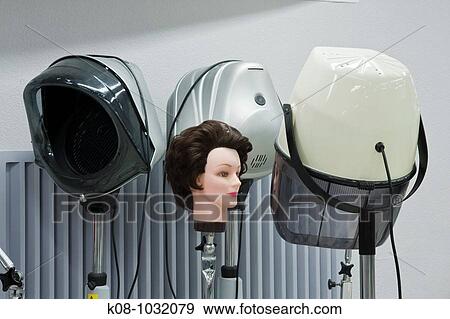 Hair-dryers in hairdresser View Large Photo Image Stock Photo - Hair-dryers in hairdresser. Fotosearch