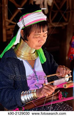 Half body image of a Longneck Karen woman weaving a scarf, Mae Hong Son, Thailand, Southeast Asia. View Large Photo Image Stock Image - Half body image of a Longneck Karen woman weaving a scarf, Mae Hong Son, Thailand, Southeast Asia.. Fotosearch