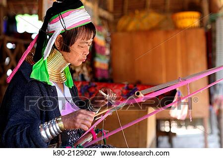 Half body image of Longneck Karen woman warving a scarf, Mae Hong Son, Thailand, Southeast Asia. View Large Photo Image Stock Photo - Half body image of Longneck Karen woman warving a scarf, Mae Hong Son, Thailand, Southeast Asia.. Fotosearch