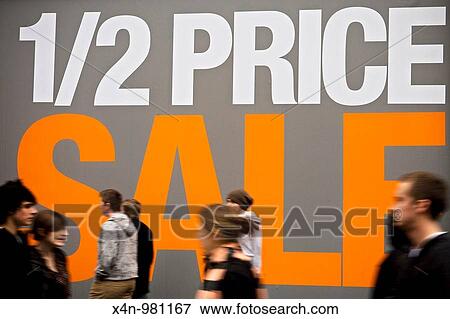 Half price sale sign on shop window on Oxford street London, UK View Large Photo Image Stock Photo - Half price sale sign on shop window on Oxford street London, UK. Fotosearch