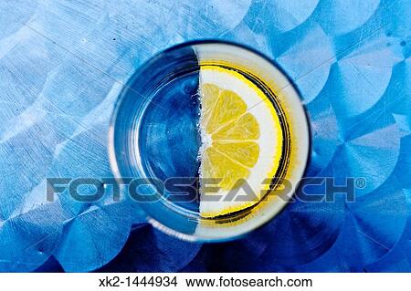 Half slice of lemon View Large Photo Image Picture - Half slice of lemon. Fotosearch