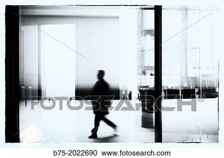 Hall of an office building with a unrecognizable executive, City, London, England, UK View Large Photo Image Stock Image - Hall of an office building with a unrecognizable executive, City, London, England, UK. Fotosearch