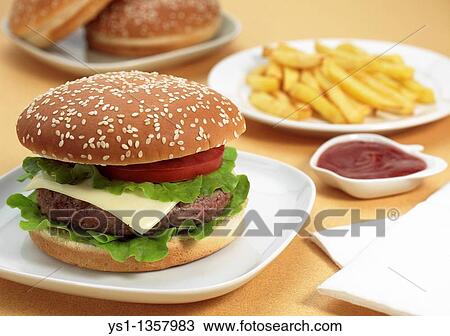 HAMBURGER WITH FRENCH FRIES AND KETCHUP SAUCE View Large Photo Image Stock Image - HAMBURGER WITH FRENCH FRIES AND KETCHUP SAUCE. Fotosearch