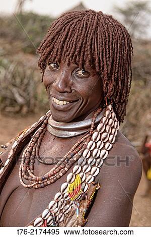 Hamer woman in the Dimeka market in the Omo Valley, Ethiopia. View Large Photo Image Stock Photography - Hamer woman in the Dimeka market in the Omo Valley, Ethiopia.. Fotosearch