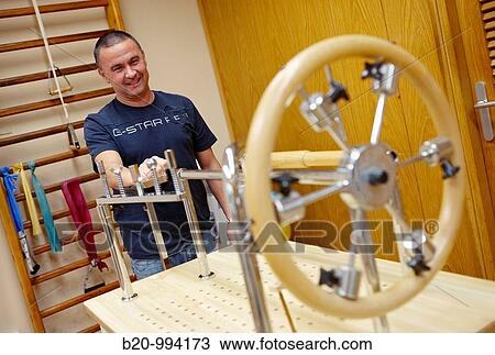 Hand exercise table, increasing force production and flexibility, rebahilitation. Policlinica Gipuzkoa, San Sebastian, Donostia, Euskadi, Spain View Large Photo Image Stock Image - Hand exercise table, increasing force production and flexibility, rebahilitation. Policlinica Gipuzkoa, San Sebastian, Donostia, Euskadi, Spain. Fotosearch