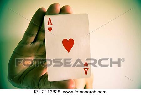 Hand holding an ace of hearts. View Large Photo Image Stock Photo - Hand holding an ace of hearts.. Fotosearch