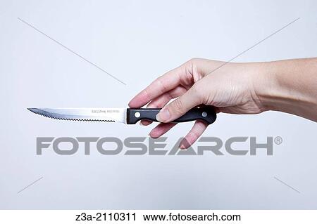 Hand Holding Knife, Hand Gesture, Studio shot View Large Photo Image Stock Image - Hand Holding Knife, Hand Gesture, Studio shot. Fotosearch