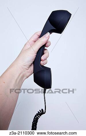 Hand Holding Phone Horn, Hand Gesture, Studio shot View Large Photo Image Stock Image - Hand Holding Phone Horn, Hand Gesture, Studio shot. Fotosearch