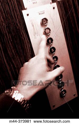 Hand in an elevator. View Large Photo Image Stock Image - Hand in an elevator.. Fotosearch