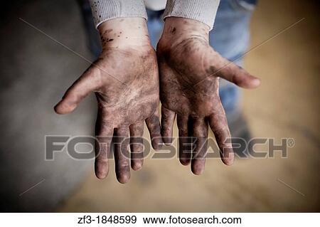 Hand of a ten years old boy dirty with black paint View Large Photo Image Stock Photo - Hand of a ten years old boy dirty with black paint. Fotosearch