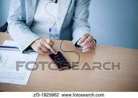 Hand of a woman working in her desk with the computer mouse View Large Photo Image Stock Image - Hand of a woman working in her desk with the computer mouse. Fotosearch
