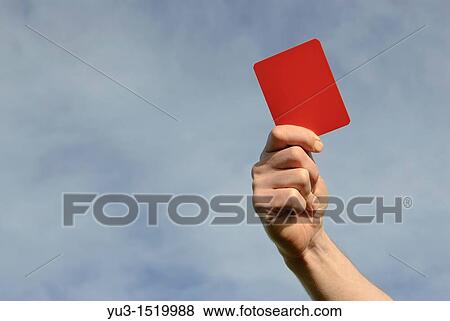 Hand of referee waving red card View Large Photo Image Stock Photo - Hand of referee waving red card. Fotosearch